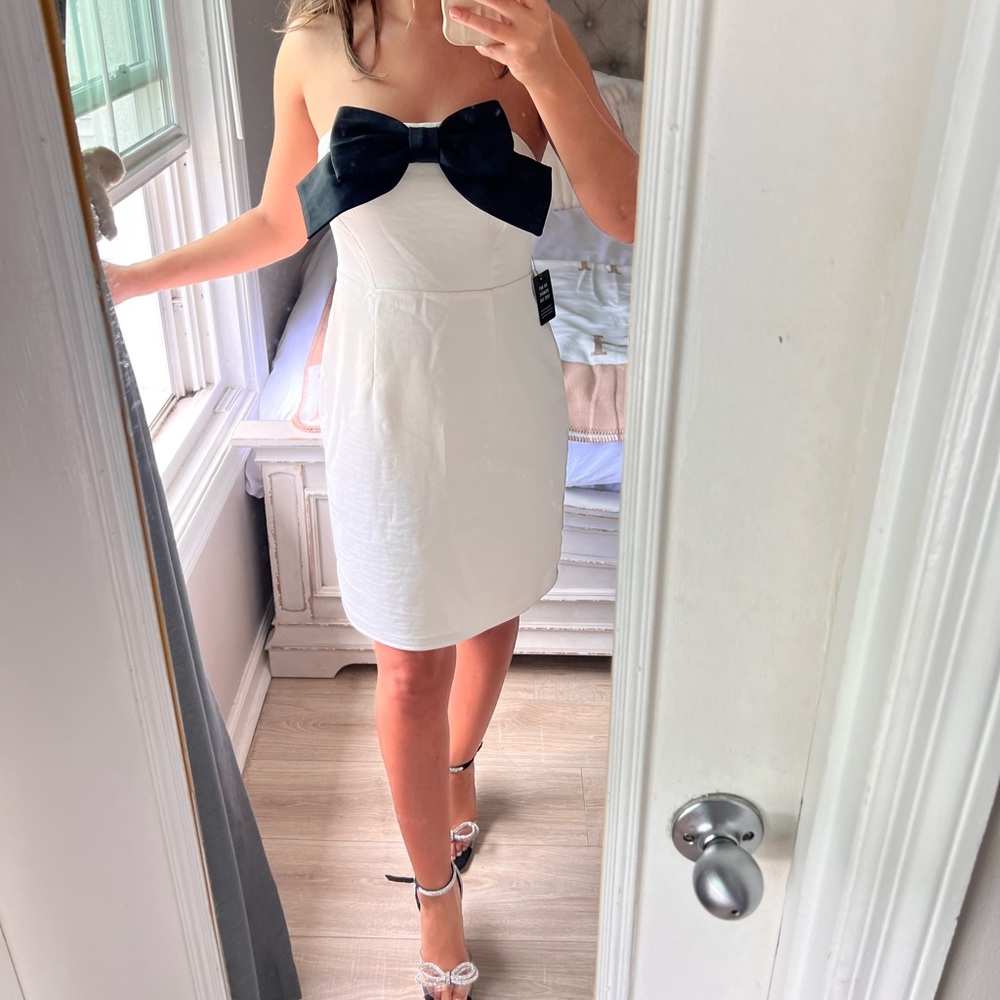 MAKE A OFFER - EXPRESS QUIET LUXURY BOW DRESS SIZE SMALL